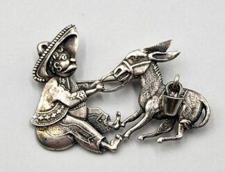 LOT 298 (3298611) Est R500 to R1500 - A Novelty Mid 20th Century Ladies SA Sterling Silver Figural Mexican Peasant and Stubborn Donkey Brooch circa 1950s-1960s
