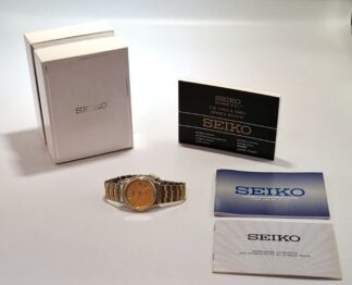 LOT 274 (32980) Est R500 to R1500 - A Gents Seiko Quartz Two-tone (Gold-plate and Stainless Steel Wristwatch