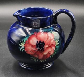 LOT 177 (32860) Est R1000 to R3000 - A Post-war Glazed Ceramic Anemone footed Jug, designed by Walter Moorcroft (1917 - 2002) circa 1949