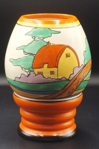 LOT 144 (32974) Est R5000 to R15000 - A Striking Clarice Cliff Fantasque hand-painted Bizarre Newport Pottery  Glazed Earthenware Orange Roof Cottage Vase circa 1932
