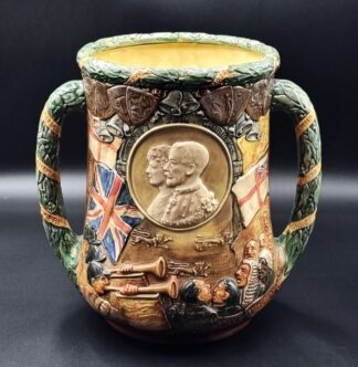 LOT 178 (329071) Est R3000 to R6000 - A Royal Doulton Commemorative Silver Jubilee (1910-1935) Glazed Earthenware Loving Cup (Uncrowned version), designed by Harry Fenton and Charles Noke