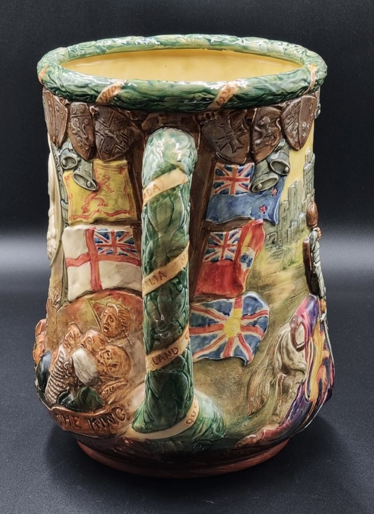 LOT 178 (329071) Est R3000 to R6000 – A Royal Doulton Commemorative Silver Jubilee (1910-1935) Glazed Earthenware Loving Cup (Uncrowned version), designed by Harry Fenton and Charles Noke - Image 4