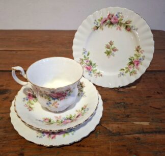 LOT 125 (33119) Est R500 to R1500 - 6 x Royal Albert Bone China Moss Rose pattern Tea Trios