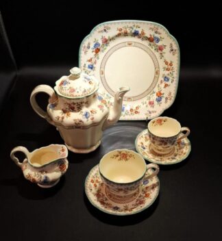 LOT 147 (32974) Est R3000 to R6000 - An Extensive Post-war Copeland Spodes Glazed Earthenware Spode's Royal Jasmine pattern dinner, tea and mocha service  for 8 circa 1946-1947