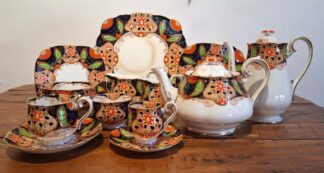 LOT 138 (33119) Est R1000 to R3000 - An Early 20th Century English Interwar period Royal Albert Crown China Tea set and Mocha Set