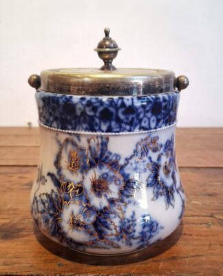 LOT 167 (33097) Est R500 to R1500 - An Early 20th Century Edwardian period (1901-1910) Wiltshaw and Robinson Glazed Earthenware Flow Blue Petunia pattern Biscuit Barrel fitted with Electroplated mounts and swing-handle and stepped domed and finialled cover