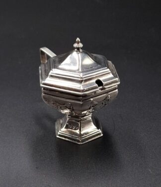 LOT 25 (3295150) Est R1000 to R3000 - An Edward VII Silver Hexagonal footed Mustard Pot with domed finialled cover in the Adam Style