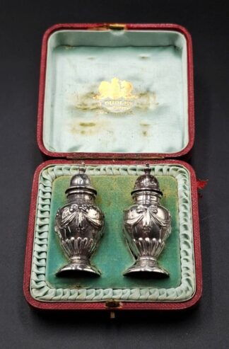 LOT 1 (32958) Est R600 to R1800 - A Pair of Late Victorian Silver Footed Classical-style Salt and Pepper Cellars