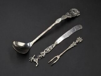 LOT 53 (32974) Est R600 to R1200 - A 20th Century Dutch Silver Rose and Leaf pattern Cream Ladle