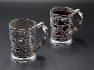 LOT 66 (32964) Est R300 to R600 - A pair of Unusual Japanese White Metal Toddy Glass Frames