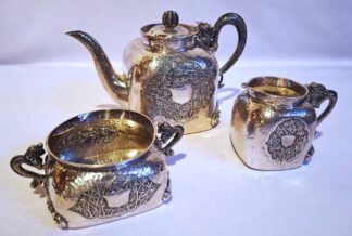 LOT 52 (32974) Est R15000 to R30000 - A Late 19th Century - Early 20th Century Fine Chinese Export Silver Late Qing Dynasty period (1644-1912) Three-piece Dragon Tea Set circa 1900