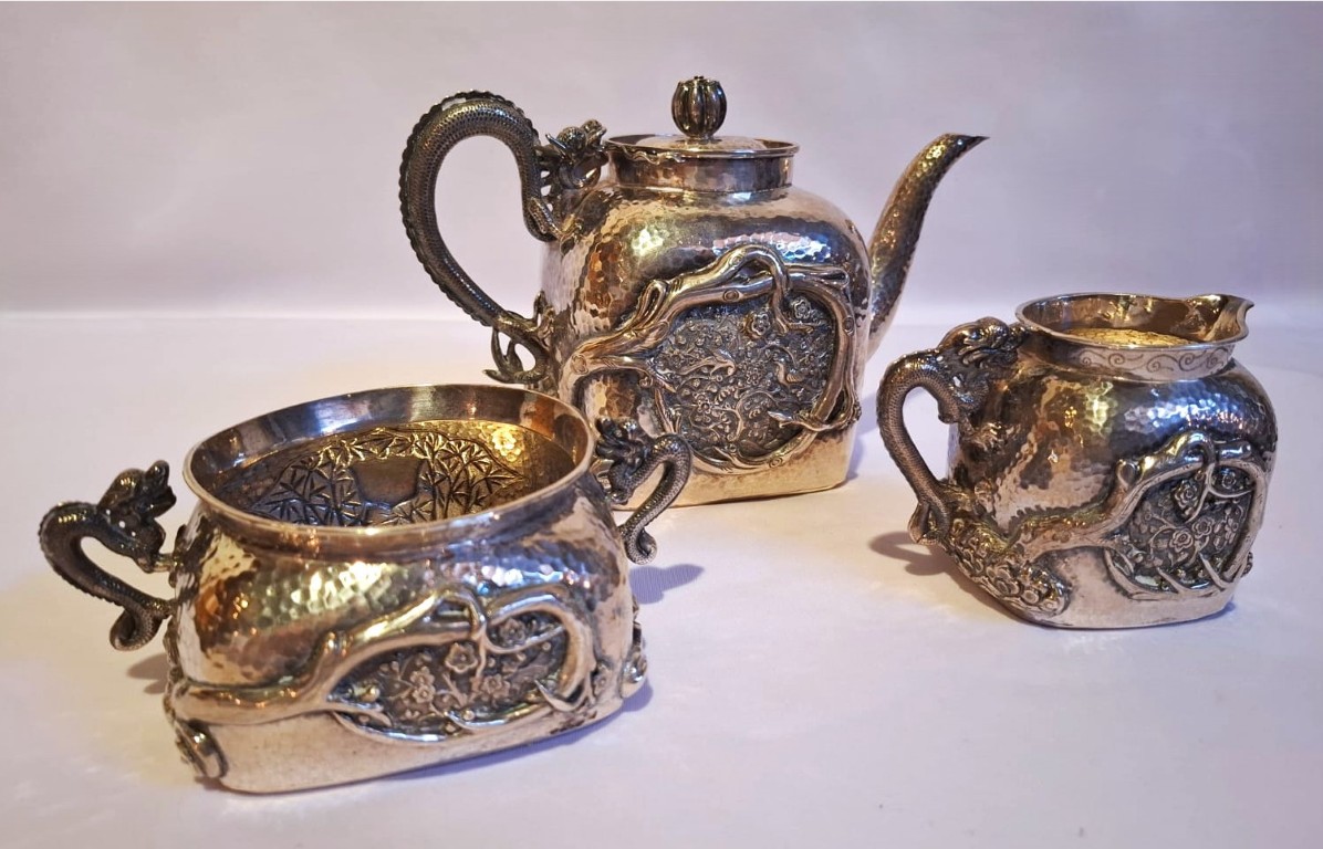 LOT 52 (32974) Est R15000 to R30000 – A Late 19th Century – Early 20th Century Fine Chinese Export Silver Late Qing Dynasty period (1644-1912) Three-piece Dragon Tea Set circa 1900 - Image 2
